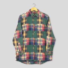 Vintage Santa Barbara Polo & Racquet Club Patchwork Flannel Large Polo Checkered Rebuild Tartan Multicolor Shirt Plaid Checked Oxford Size L Good Used Condition. No Stains and No Holes. Size (On Tag) : Size L **To make sure if it FITS YOU, refer at the exact measurements. Size Measurement (All measurements were taken lying flat) : Width [armpit to armpit] : 21.5 inches / 55 cm Length [shoulder to end of garment] : 30 inches / 76 cm THIS IS USED CLOTHING! PLEASE DON`T EXPECTED IT TO BE LIKE NEW O Multicolor Patchwork Shirt For Fall, Green Patchwork Shirt For Fall, Green Long Sleeve Patchwork Shirt, Plaid Patchwork Cotton Shirt, Vintage Plaid Patchwork Tops, Patchwork Flannel, Racquet Club, New O, Vintage Santa