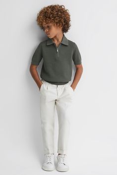 The Burnham half-zip polo shirt is a textured, open-knit style which slightly slouches over the ribbed waistband for a relaxed shape. Open knitted construction Half-zip polo neckline Ribbed trims Boy Kid Outfit, Ootd Kids Boys Outfit, Boys Kids Outfit, Outfit For Kids Boys, Kids Boys Fashion, Polo Shirt Outfits, Dark Sage, Zip Polo