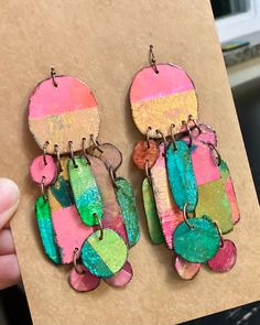 Colors, and textures, and layers, Oh My! These statement earrings are made from hand painted prints that are paper mached on to thick cardboard. Each piece is finished with a high gloss sealer for a result that is super lightweight, sturdy, and oh so full of color.  Earrings hang about 4 inches from their nickel free, wire hooks. what adventures will you have in these over the rainbow statements? Painted Clay Earrings, Cardboard Earrings, Earrings Paper, Abstract Ideas, Painted Clay, Paper Earrings, Color Earrings, Polymer Crafts, Paint Print