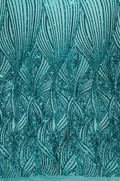 an abstract blue background with wavy lines and dots in the shape of waves, which are embellished by green glitters