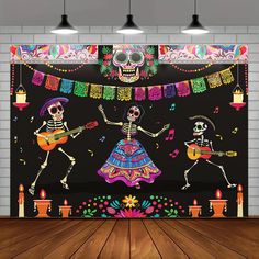 an image of skeletons playing guitar and dancing in the room with candles on the floor