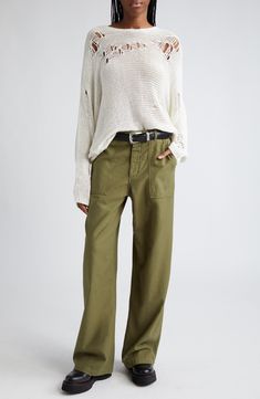 These utility pants are cut in a wide-leg silhouette from Japanese surplus military sateen that's slubbed and treated with an enzyme wash for softness. 32 1/2" inseam; 22" leg opening; 13 1/2" front rise; 17" back rise (size 29) Button fly Front slant pockets; back button-flap patch pockets 100% cotton Machine wash, dry flat Imported SPACE: A shop for emerging and advanced designers Olive Wide Leg Military Pants, Military Style Wide Leg Olive Pants, Military Style Olive Wide Leg Pants, Military Style Wide Leg Relaxed Bottoms, Military Style Wide Leg Bottoms With Relaxed Fit, Olive Wide Leg Pants For Fall, Relaxed Fit Wide Leg Military Cargo Jeans, Military Style Straight Leg Bottoms For Fall, Spring Military Wide Leg Pants