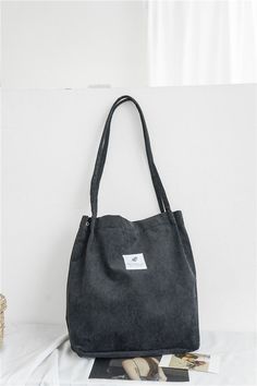 Features: Our Beautiful Corduroy Canvas Bags are the perfect stable for every shoulder bag collection. Made to be simple, minimalistic and elegant to perfectly enhance any outfit! Comes in many diverse colors for all occasions so you can go from a casual day out in the city to a nice day out at the beach without skipping a beat. Size: 34 cm x 33 cm x 12 cm and shoulder strap is about 30 cm long comes in 8 beautiful colors. Bag Women Fashion, Handbag Outfit, Original Bags, Canvas Handbags, Canvas Shoulder Bag, Womens Tote, Cotton Bag, Fun Bags, Shoulder Handbags