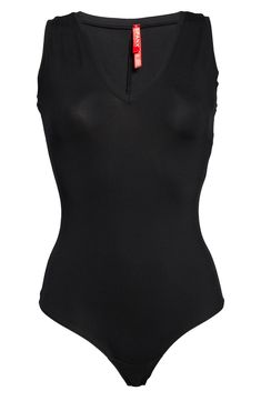 Start your look off right with this superflattering and sleek bodysuit that pairs perfectly with your wardrobe essentials. Made from a soft, stretchy knit, it smoothes out your figure for a tucked-in and bulk-free fit. V-neck Sleeveless Cotton-lined snap gusset Comfortable stretch fabric is opaque enough to wear as your only layer 77% polyester, 23% elastane Machine wash, tumble dry Imported Women's Clothing Stretch V-neck Shapewear Bodysuit, Chic Seamless V-neck Bodysuit, Smoothing V-neck Bodysuit, Seamless Second-skin Bodysuit For Night Out, Night Out Seamless Second-skin Bodysuit, Second-skin V-neck Bodysuit With Lined Body, Minimal Stretch Bodysuit For Night Out, Night Out Bodysuit With Minimal Stretch, Elegant Second-skin Bodysuit With V-neck