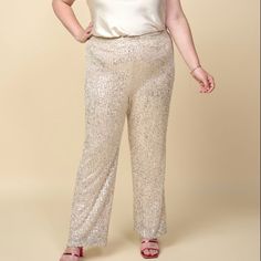 These Party-Ready Pants Shimmer From Every Angle, Saturated In Light-Reflecting Sequins. The High-Rise Pair Hugs The Waist Before Falling To A Slightly Flared Shape Through The Legs. High Waist Hidden Side Zipper Allover Sequin Embellishment Slightly Flared Legs 97% Polyester 3% Spandex Holiday Trousers For Night Out, Festive Wide Leg Pants For Holidays, Holiday Stretch Wide Leg Bottoms, Fitted Straight Pants For Festive Occasions, Glamorous Wide Leg Holiday Pants, Glamorous Holiday Wide Leg Pants, Full Length Bottoms For Party Season, Full Length Bottoms For Festive Party Season, Fitted Pants For Holiday Festivities