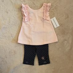 Calvin Klein Baby Girls Outfit Size 12 Months. Sleeveless Shirt And Capri Pants. Pink Shirt And Black Capri Pants. Brand New! Pink Sleeveless Cotton Sets, Pink Sleeveless Playtime Sets, Pink Sleeveless Sets For Playtime, Sleeveless Pink Sets For Playtime, Cute Pink Sleeveless Clothing Sets, Cute Pink Sleeveless Sets, Cute Sleeveless Pink Sets, Formal Boys Outfit, Calvin Klein Set