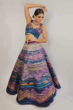 Multicolor lehenga with metallic strip embroidery and mountain print. Paired with blouse.
Component: 2
Pattern: Embroidery, Printed
Type Of Work: Metallic, mountain
Neckline: Sweetheart
Sleeve Type: Sleeveless
Fabric: Imported Satin
Color: Multi Color
Other Details: 
Inverted V hem
Back deep V neck
Mountain print lehenga
Occasion: Destination Wedding - Aza Fashions Luxury Multicolor Blouse Piece With Cutdana, Luxury Multicolor Cutdana Blouse Piece, Luxury Multicolor Cutdana Blouse, Luxury Multicolor Digital Print Lehenga, Luxury Multicolor Digital Print Choli, Luxury Multicolor Padded Blouse Piece, Cheap Multicolor Padded Blouse Piece, Affordable Multicolor Padded Blouse Piece, Multicolor Lehenga