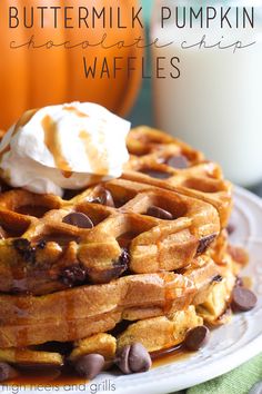 buttermilk pumpkin waffles with chocolate chips and whipped cream