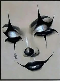 a drawing of a woman's face with black and white make up on it