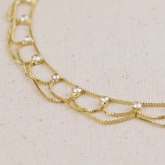 Adorn your ankle with the exotic charm of this 18k gold filled Bali anklet. Inspired by traditional Balinese craftsmanship, this delicate piece features intricate detailing and a timeless design. The lustrous gold finish complements sun-kissed skin, making it perfect for beach vacations or adding a touch of bohemian elegance to everyday wear. Metal: 18k gold filled 1/20 Size: 9 inches with 2 inches extender 0.8mm Box Chain Hypoallergenic jewelry. Anti-tarnish jewelry. Waterproof Made in Brazil Dainty Gold Anklet With Delicate Chain, Dainty Gold Anklets For Wedding, Adjustable Gold Anklet With Delicate Chain, Elegant Yellow Gold Anklets With Delicate Chain, Elegant Adjustable Gold Anklets, Delicate Gold Anklet With Adjustable Chain, Gold Adjustable Dangle Anklets, Adjustable Gold Plated Anklets, Gold Adjustable Chain Anklet For Beach