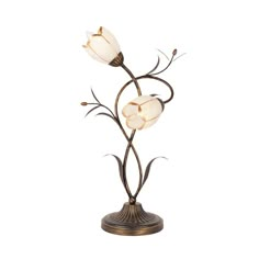 a lamp that is on top of a metal stand with flowers in the middle of it