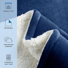 the back side of a blue and white blanket with text that reads warm & cozy reversible