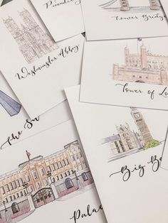 several envelopes with drawings of buildings on them and the names of their respective locations