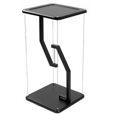 a black table with an upside down glass shelf