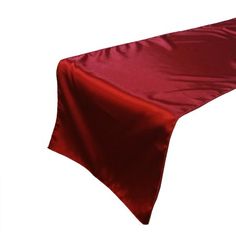 a red table runner on a white background