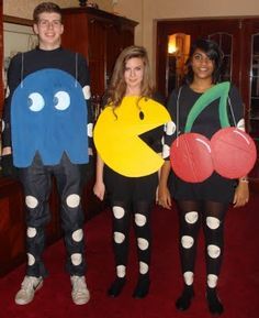 three people are dressed up as pac - man and cherrypear from the movie pacman