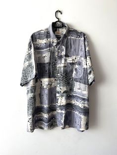 Vintage Mens Short Sleeve Shirt Grandpa Vacation Shirt Bohemian Summer Singlet Button Up Hipster Shirt Size Plus Extra Large Patterned Shirt Label size: D/A/F  45/46; GB 18/18 Estimated  size: XXL Measurements: (lying flat) Length - 32.5"/ 82.5 cm Shoulders: 21"/ 53.3 cm Pit to pit: 27.5"/ 70 cm Waist: 27.5"/ 70 cm Sleeve: 10.5"/ 26.7 cm Collar: 18.5"/ 47 cm Please check measurements to insure a proper fit. Remember to allow yourself some extra room for movement. You can compare these with somet Bohemian Short Sleeve Shirt, Bohemian Shirt With Relaxed Fit And Button Closure, Bohemian Relaxed Fit Shirt With Button Closure, Vintage Beach Shirt With Buttons, Vintage Buttoned Shirt For Beach, Bohemian Collared Shirt With Buttons, Bohemian Collared Patterned Shirt, Relaxed Fit Bohemian Collared Shirt, Shirt Label