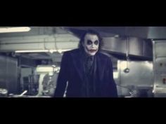 the joker is standing in an industrial kitchen