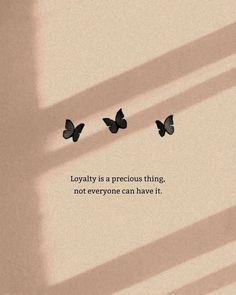 two butterflies flying in the air with a quote on it that says, loyvillity is a precious thing not everyone can have it