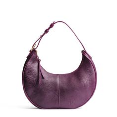 Plum*Classic | Crescent shaped shoulder bag with zipper closure and adjustable strap Purple Shoulder Bag, College Clothing, Current Aesthetic, Cinnamon Bears, Fashion Boards, Portland Leather Goods, Classic Purse, Best Leather Jackets, Winter Girl