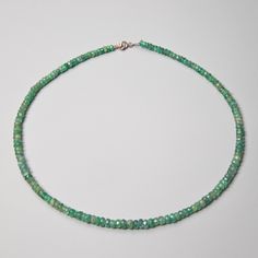 "Natural Emerald Beaded Necklace in 925 Sterling Silver Details: Gemstone: Emerald Av Gemstone dimensions: 3 mm Total length for each item: 40 cm / 15.7\"  + extends to 45 cm/ 18\" Check out the full catalogue of beaded necklaces here: https://www.etsy.com/shop/PaleoGemsJewellery?section_id=40958762 Please note; Our jewelry pieces crafted with genuine stones, so there may be slight variations in color and shape from the images shown.   Caring for gemstones: Always store your jewellery pieces individually. To maintain the gemstone's natural appearance, wash it with warm water and dry it i with a soft cloth. Avoid exposure to excessive amounts of heat and soap. Take care not to loosen or disturb the jewellery setting. Remember to  protect your jewelry from impact against hard surfaces and av Sterling Silver Rondelle Gemstone Beads Jewelry, Silver Faceted Round Beads Gemstones, Sterling Silver Crystal Necklace With Round Beads, Sterling Silver Single Strand Beaded Necklaces, Sterling Silver Round Beaded Single Strand Necklace, Round Sterling Silver Single Strand Beaded Necklace, Sterling Silver Rondelle Beads For Jewelry Making, Sterling Silver Rondelle Gemstone Beaded Necklace, Sterling Silver Gemstones For Jewelry Making