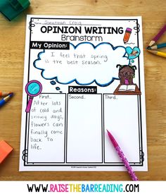 an opinion writing form with pencils and markers