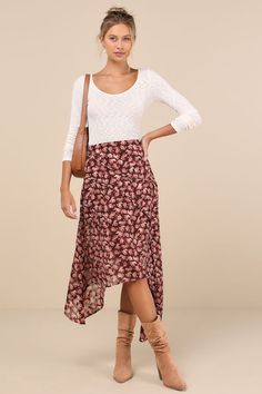 Get ready to be a chic standout wherever you go in the Lulus Elevated Exception Brown Floral Asymmetrical Midi Skirt! Lightweight woven fabric boasts a sweet floral print (and a subtle burnout jacquard design) as it shapes a high waist and a figure-skimming, asymmetrical silhouette with floaty tendrils at both sides. Asymmetrical seaming accents throughout before falling to a midi hem. Hidden zipper/clasp at side. Fit: This garment fits true to size. Length: Ankle length. Size medium measures 26.50" from waist to hem. Waist: Fitted - very fitted at natural waist. Hip: Not Fitted - fuller skirt allows room for hips. Fabric: Fabric has no stretch. Lined to mid-thigh. Shell: 100% Polyester. Lining: 100% Polyester. Hand Wash Cold. Do Not Bleach. Line Dry. Iron Low Heat. Imported. Lulus | Eleva Midi Skirt Floral, Asymmetrical Midi Skirt, Jacquard Design, Floral Midi Skirt, Fall Fits, Sweet Floral, Brown Floral, Bottom Clothes, Full Skirt