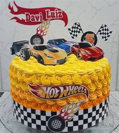 a birthday cake with hot wheels on it