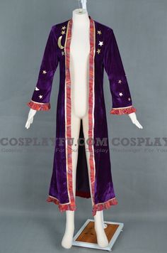 a mannequin wearing a purple robe with stars on it