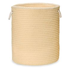 a large round basket with rope on the bottom and handles in natural color, sitting on a white background