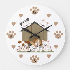 a white clock with dogs and puppies on it's face, surrounded by hearts