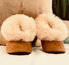 Unisex alpaca slippers from Peru!The unisex Luxurious Alpaca Fur Slippers keep your feet nice and cozy even on the most blustery winter’s eve. These fur slippers are very well made, ensuring they will last for years.These baby alpaca slippers are made from the finest Alpaca fur and are guaraunteed to keep ones feet warm this winter.Material: Alpaca outer, sheepskin wool lines the inside, bottom suedeBenefits and Features:– No animal was ever harmed to make these items.– Each one is totally uniqu Fluffy Slip-on Cozy Slippers, Fluffy Slip-on Slippers For Indoor Use, Fluffy Slip-on Indoor Slippers, Cozy Fluffy Slip-on Slippers, Indoor Slippers With Plush Lining And Faux Fur, Indoor Faux Fur Slippers With Plush Lining, Cozy Faux Fur Slippers With Round Toe, Comfortable Fluffy Slippers With Round Toe, Cozy Closed Toe Slippers With Plush Lining