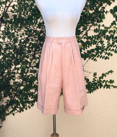 "High waisted Bermuda shorts by David Hollis in a beautiful pink color linen fee rayon blend with two side pockets. Button and zipper front closure.  Marked size 10. Ramie/Rayon blend  Great vintage condition! Measurements (flat): waist: 28\" hips: 40\" overall length: 21\" rise: 14\" inseam: 8\"" Pink Pants With Built-in Shorts For Spring, Pink Linen Shorts For Summer, Pink Short Length Pants For Spring, Chic Pink Cotton Shorts, Spring Bermuda Shorts In Pink, Pink High-waisted Bermuda Shorts For Spring, Casual Pink Linen Shorts, Pink Short Pants With Pockets, Short Pink Pants With Pockets