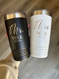 two personalized wedding tumblers are shown with the names mr and mrs