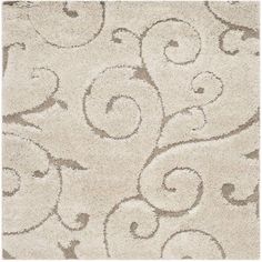 a white rug with swirls on it