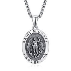 Experience timeless elegance with our retro sterling silver Saint Michael pendant necklace for men, meticulously crafted to blend traditional charm with modern sophistication, making it a perfect accessory for any occasion. This exceptional piece showcases a sleek design without stones, highlighting the intricate detailing of Saint Michaels emblem and the inspiring St Michael Protect Us inscription. Ideal for men who appreciate refined craftsmanship and the protective symbolism of this patron sa Saint Michaels Mens Pennant, St Michael Pendant, Necklace Stand, Saint Michael, Patron Saints, Necklace For Men, St Michael, Men Necklace, Sleek Design