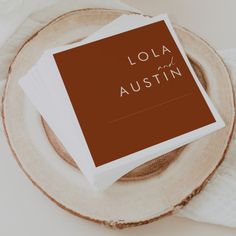 three folded napkins sitting on top of a plate with the words lola austin