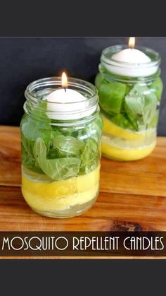 two mason jars filled with lemons and spinach