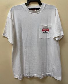 "Item :Vintage 90s Marlboro Adventure Team tee shirt Armpit to Armpit :24\" Length :29\" XLarge ( free size fit all ) metarials 100%cotton conditions used vintage refer to pics carefully made in usa original / authentic ACCEPT PAYMENT: PAYPAL ONLY ALL ITEM WILL BE SHIPPED WITHIN 3-5 BUSINESS DAY AFTER RECEIVING CLEARED PAYMENT AND DELIVERED 3-5WEEKS WE ARE USING POST MALAYSIAN WITH YOUR TRACKING NUMBER. PLEASE LEAVE YOUR PHONE NUMBER DURING PURCHASE.PHONE NUMBER REQUIRES FOR MALAYSIAN POST (VERY Cowboy Man, Jimi Hendrix T Shirt, Metallica Black, Cowboys Men, Team Shirt, Mens Tee Shirts, Mens T Shirts, Team Shirts, Mens Graphic Tee