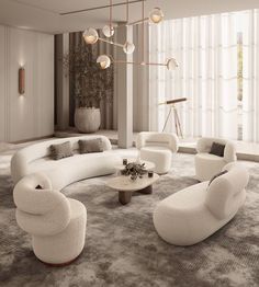 a living room filled with lots of white furniture