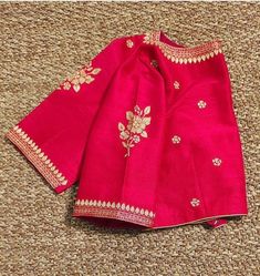 Hand embroidered ready made saree blouse / crop top/stitched saree blouse usa / red checks saree blouse/ hand embroidered blouse/zardosi blouse/red saree blouse/dark red pure silk blouse/ pitta maggam work blouse        It is very true that a perfect blouse is the one which makes your saree look stand out !! If you find one of such a style that you have been wanting to have then dont let it go !! we carry such unique trending blouses that instantly add a stylish look to any saree !!     Well..!! we understand that you may not get in your desired size/pattern, here you go with customization according to your size/pattern which we can deliver in 1-2 weeks of time period !!      Here is a beautiful Hand embroidered saree blouse in red color that has simple yet comfortable unique pitta work ha Cheap Bohemian Blouse With Zari Work, Neckline Ideas, Zardosi Blouse, Embroidery Blouse Saree, Zardosi Work Blouse, Hand Embroidery Blouse, Red Saree Blouse, Ready Made Blouse, Maggam Blouse