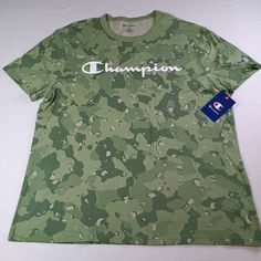 Show Off Your Sporty And Modern Style With This Champion Camouflage T-Shirt In Size Xl. The Short Sleeve Shirt Features A Crew Neckline And Is Made With Comfortable And Durable Cotton Material. It Is Machine Washable For Easy Care And Maintenance. This Shirt Is Perfect For The Summer, Fall, And Spring Seasons And Comes In A Trendy Green Color. The Graphic And Logo Accents Add To The Shirt's Uniqueness, Making It A Great Addition To Any Collection. Whether You're Hitting The Gym Or Running Errand Camouflage Graphic Print Crew Neck T-shirt, Camouflage All Over Print Cotton Tops, Camouflage All-over Print Cotton Tops, Camouflage Graphic Tee For Streetwear, Casual Camouflage Short Sleeve T-shirt, Camouflage Crew Neck T-shirt With Graphic Print, Camouflage Cotton T-shirt With Letter Print, Camouflage Crew Neck Graphic Tee, Camouflage Graphic Tee With Print