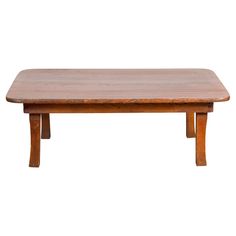 an old wooden table with two legs and a wood top on a white background for display