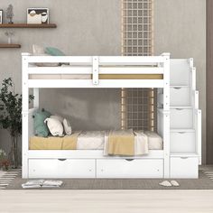 a white bunk bed with drawers underneath it in a room that has beige walls and flooring