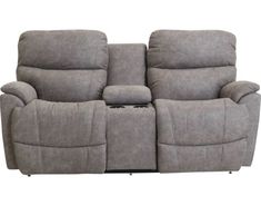 the reclining loveseat has two seats and a cup holder on top of it