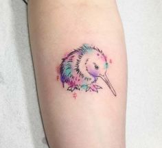 a small porcupine tattoo on the right arm and leg, with stars around it