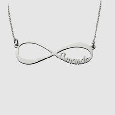 The Infinity Name Necklace is a timeless piece that intertwines elegance with personalization. Crafted delicately, it features the infinity symbol intricately inscribed with names or words of significance, symbolizing eternal connection and love. A stunning accessory that beautifully encapsulates meaningful bonds and everlasting affection. Minimalist Engraved Infinity Jewelry, Classic Sterling Silver Infinity Necklace, Elegant Silver Name Necklace With Engraving Option, Personalized Infinity Jewelry, Elegant Silver Infinity Name Necklace, Classic Silver Infinity Jewelry, Silver Infinity Name Necklace, Silver Engraved Infinity Necklace, Symbolic Infinity Jewelry For Anniversary