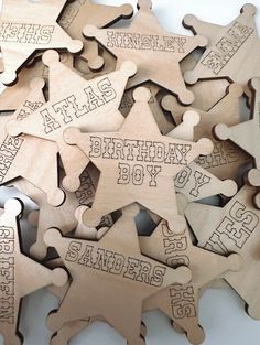 wooden puzzles with words and pictures on them are arranged in the shape of stars