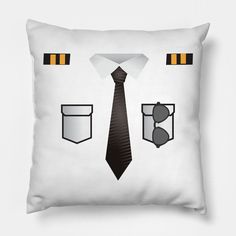 a white pillow with an image of a tie and two glasses on the bottom one