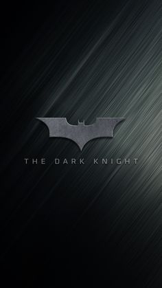 the dark knight logo is shown on a black and silver background with some lightening